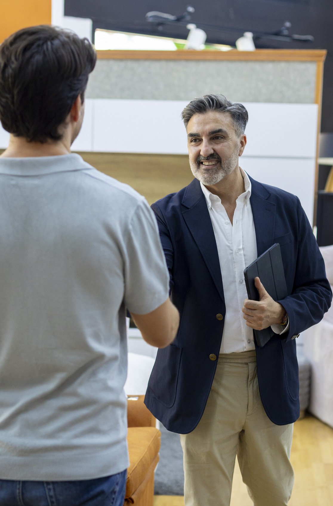 Two business men shaking hands